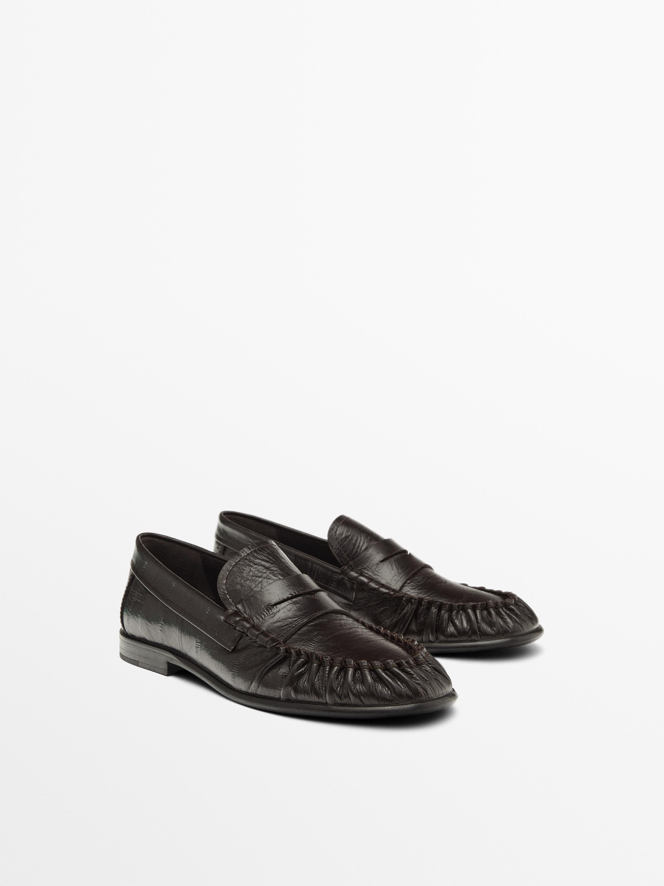 Embossed leather loafers